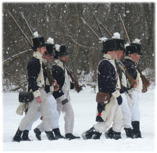 Members of Lacroixs recreated militia company on the march at the 2005 Commemoration of the Batttle of the River Raisin.                                          